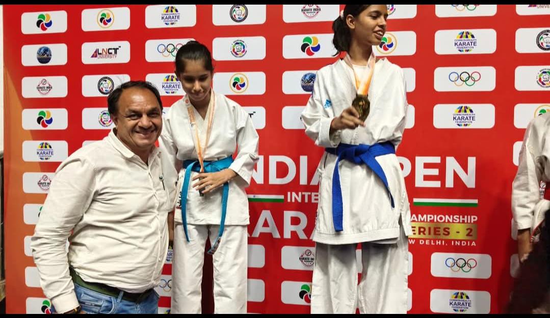 The New Heights Academy karate participants and coach